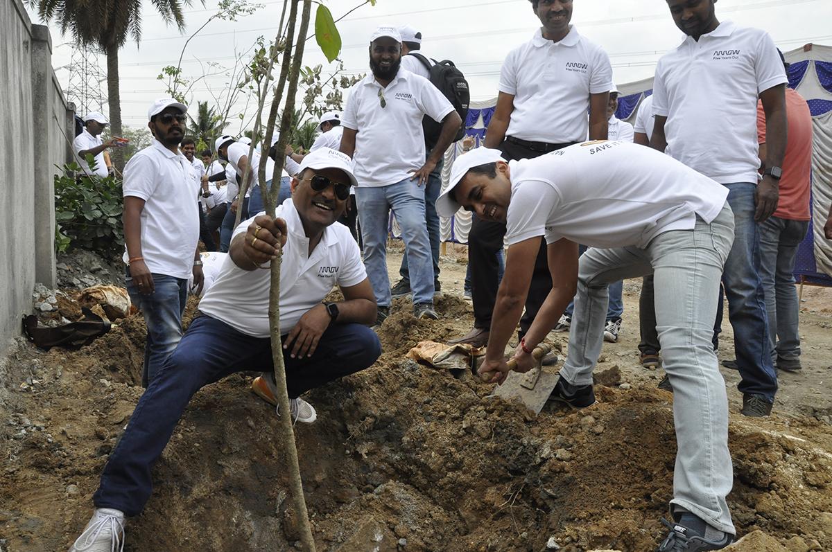 group of people planting