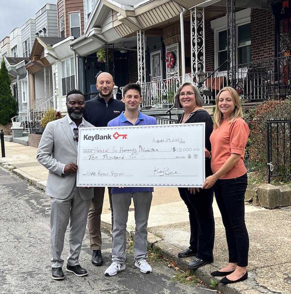 KeyBank presents a check in the amount of $10,000 to Habitat for Humanity Philadelphia. From left: Chiwuike Owunwanne, Corporate Responsibility Officer, KeyBank; Youseff Tannous, Market Retail Leader, KeyBank; Ian Eichen, Grants Manager, Habitat; Julie Vetack, Key@Work Relationship Manager, and Kathryn Fernandez, Chief Development Officer, Habitat.