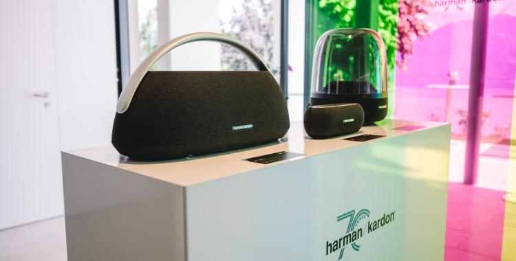 Harman Kardon portable speakers on display.