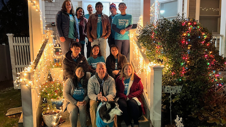 Holiday group photo on the steps of a home