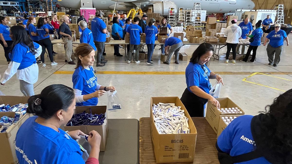 Volunteers packing hygiene kits