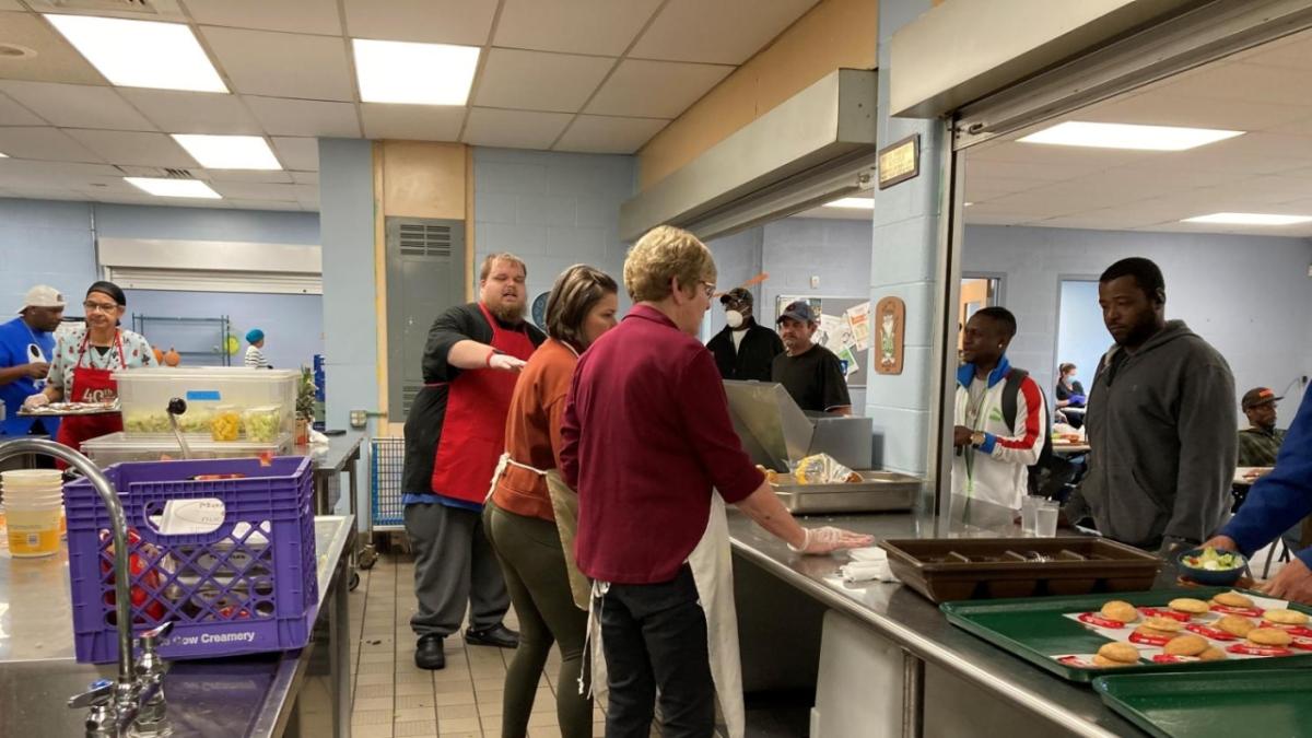 People baking in commercial kitchen