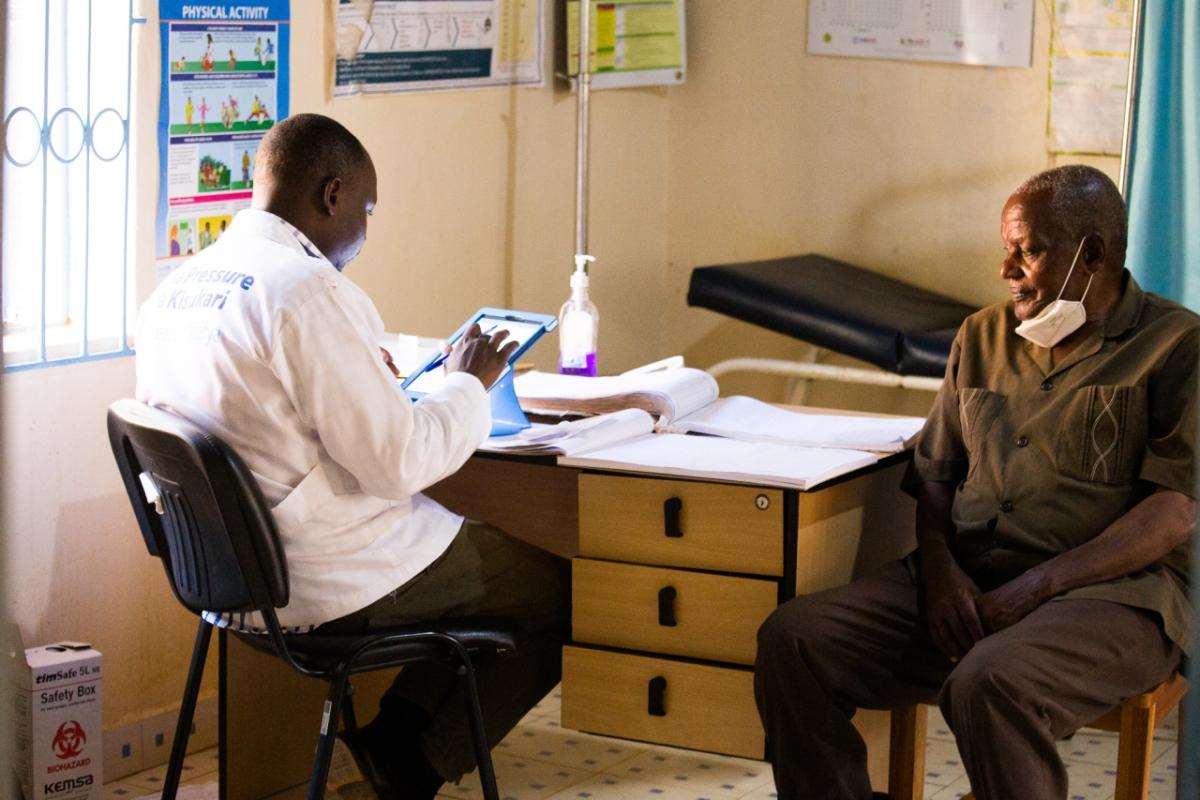 Doctor speaking with patient