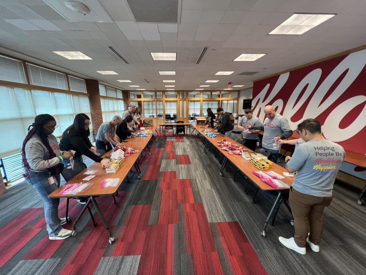 WK employees packing snacks