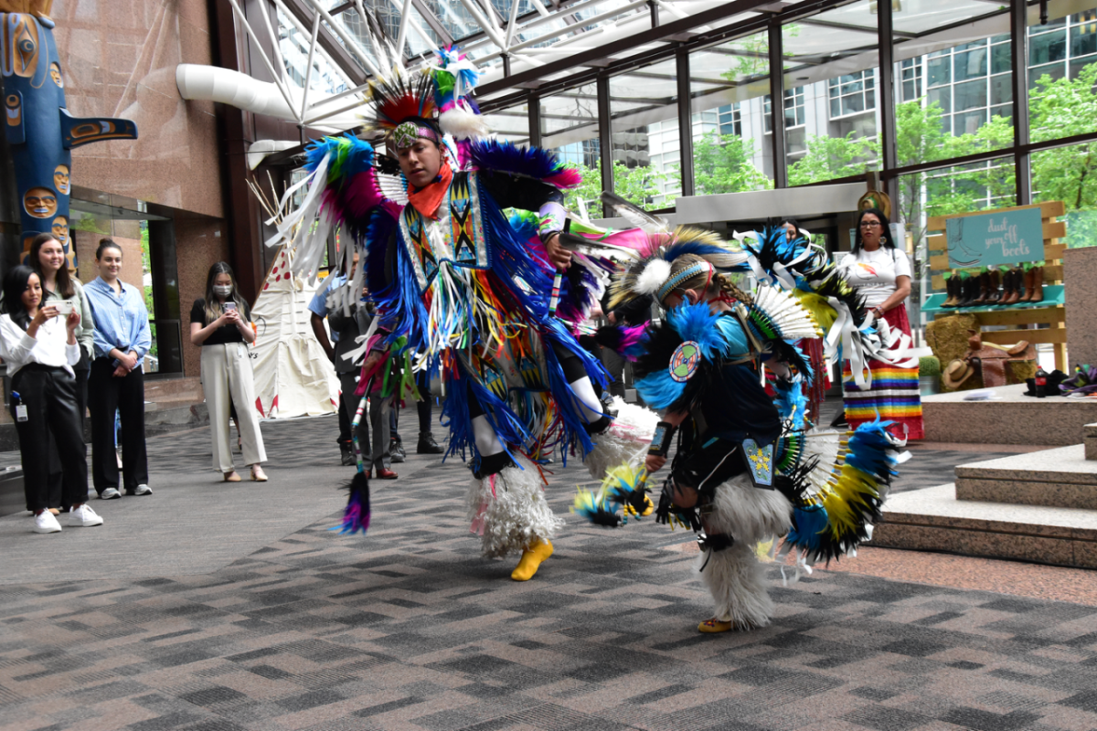 People dancing in colorful clothing