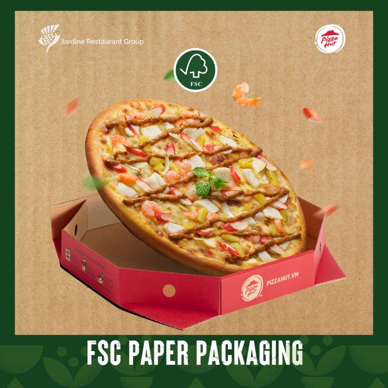 "FSC Paper Packaging" A pizza half-placed in a package.