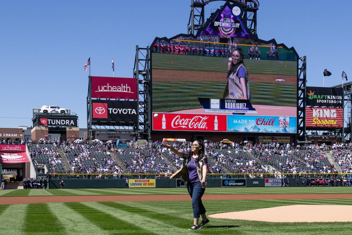 Genesis Rodriguez throwing the first pitch as part of the festivities