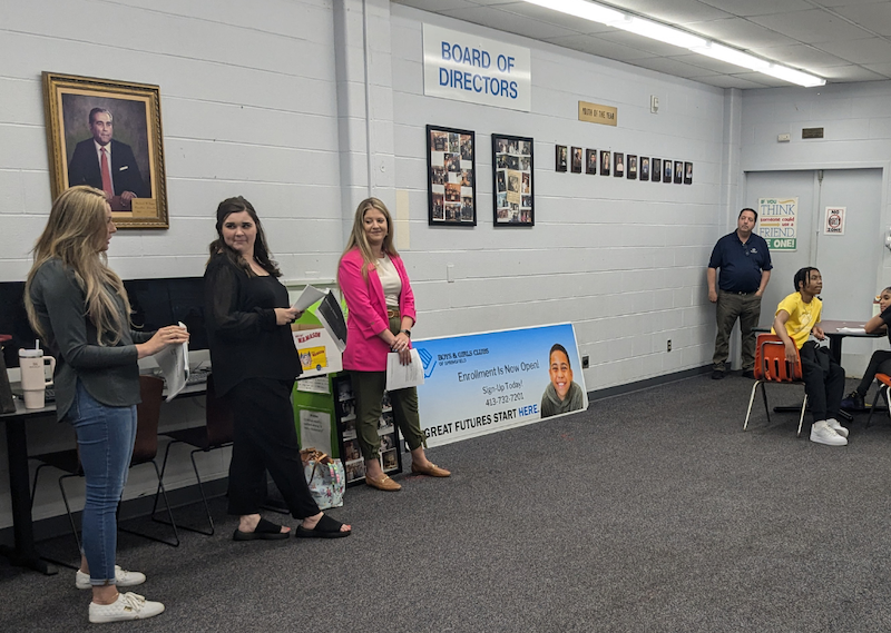 Youths at Springfield Boys & Girls Club and KeyBank representatives shown at the presentation.