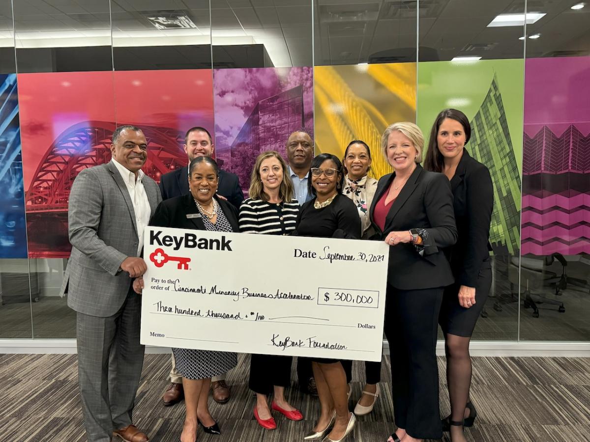 KeyBank and representatives from Cincinnati’s Minority Business Accelerator shown with a $300,000 grant check.