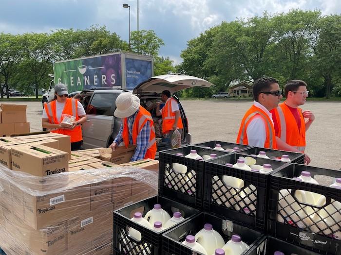 KeyBank volunteers sorting food for donations.