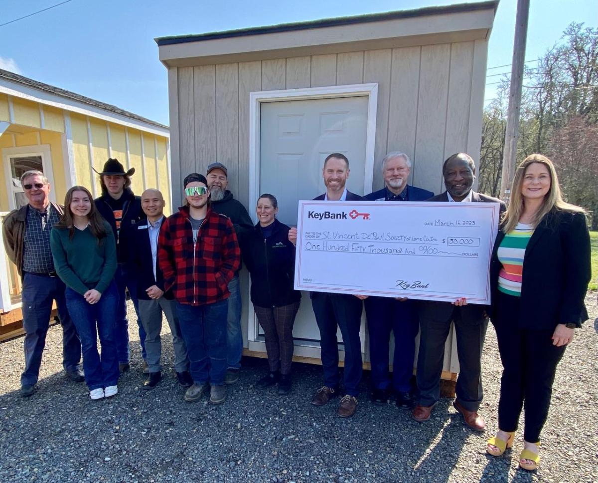 KeyBank and Team St. Vincent de Paul Society of Lane County with presentation check.