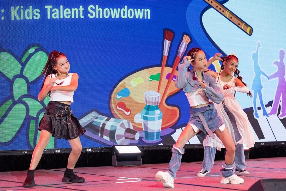 Children dancing on stage at the Kids Talent Showdown