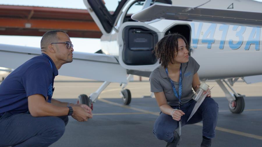 pilots near a plane