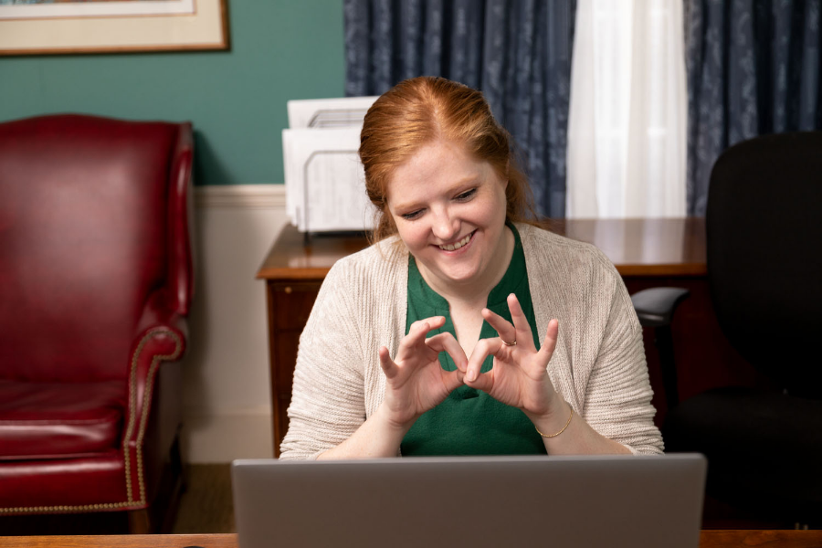 Lindsey Chambers using American Sign Language