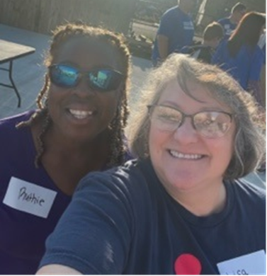 Two Aflac employees smiling