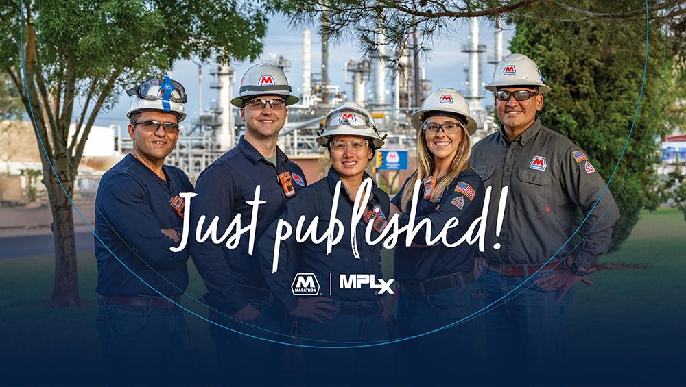 Six people wearing safety hats stood together for a photo 