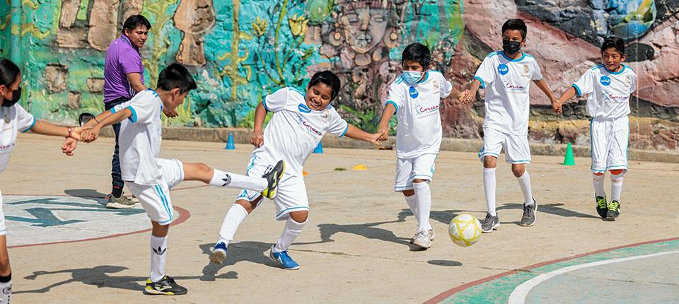 Children playing soccer