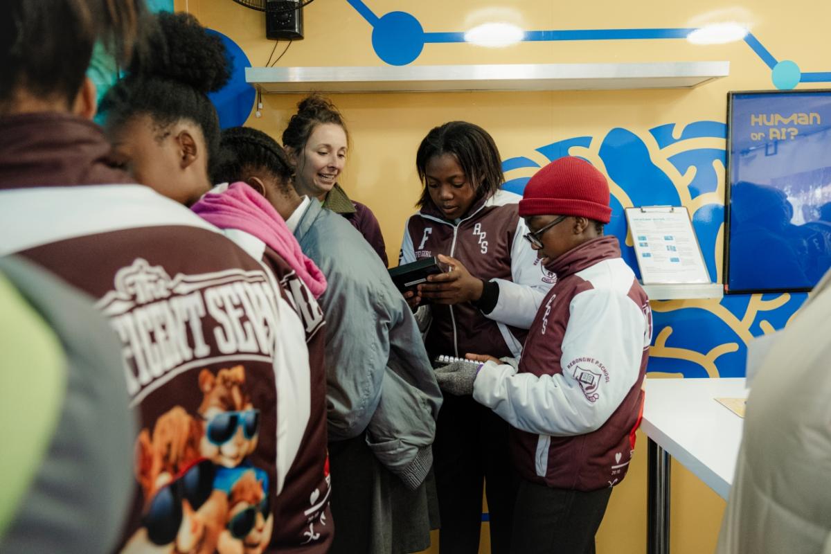 Visitors interact with hands on science in the Curiosity Cube