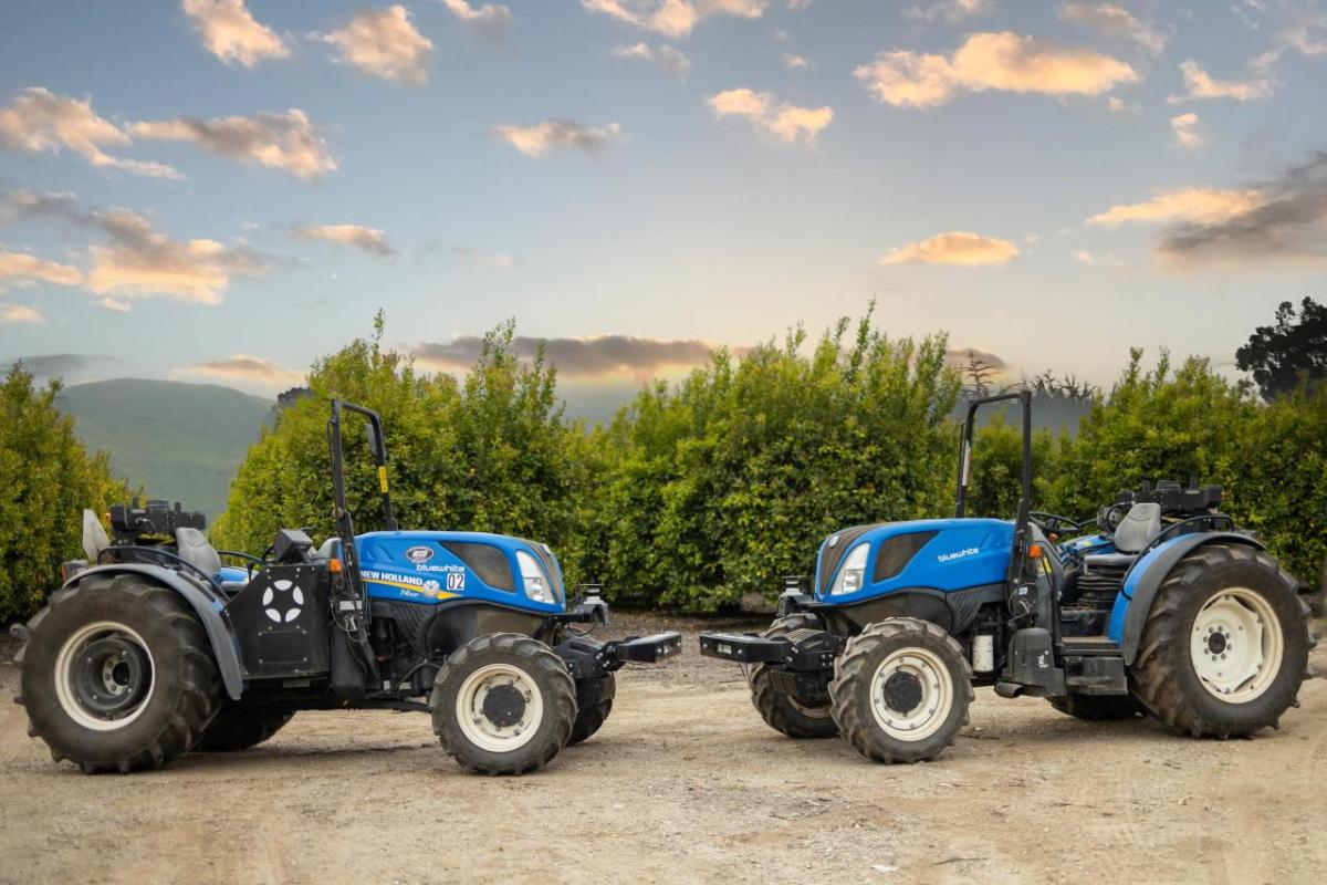 Two autonomous New Holland tractors 