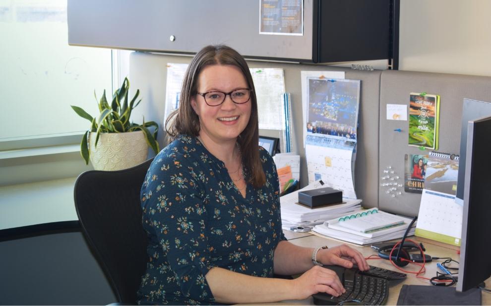 Anne Lee in an office