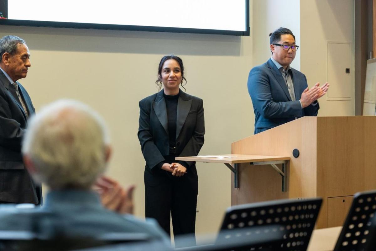 A person stood in front of an audience during an event