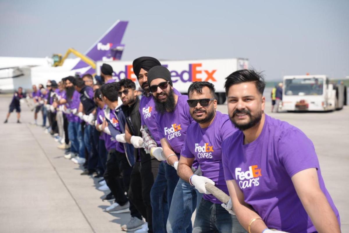 Volunteers play tug-of-war