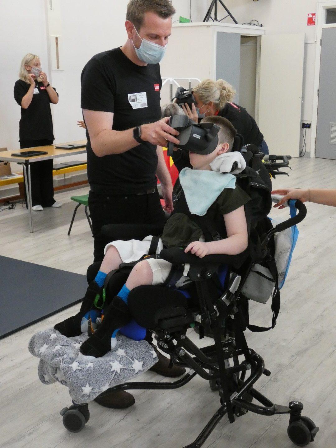 Child from Mary Hare school near Lenovo’s UK offices is taken on a virtual reality field trip with a Lenovo VR Headset.