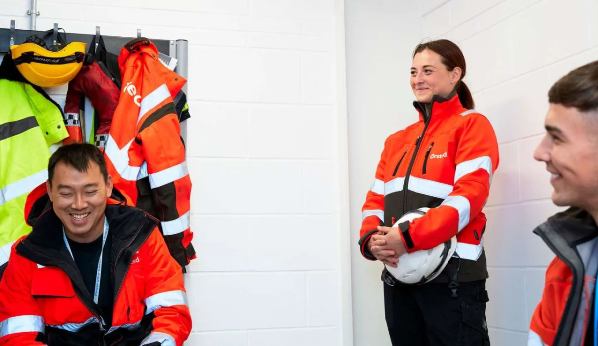 people in safety neon jackets 