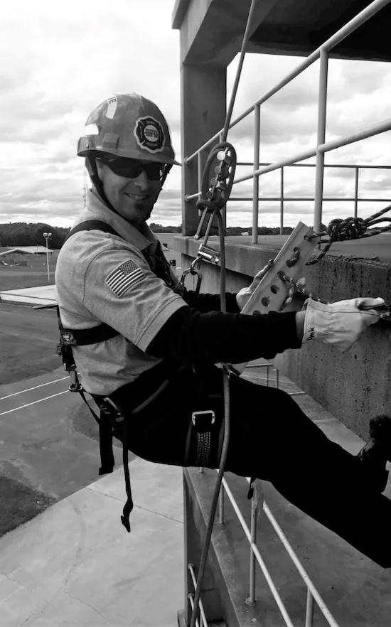 Photo: Delran Fire Chief Kevin Peak on a belay on a site.