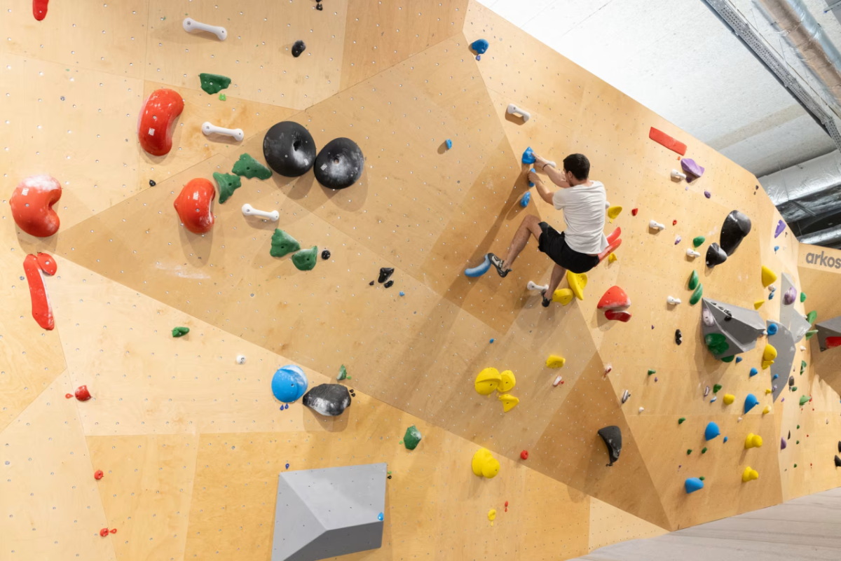 Person climbing a rock wall