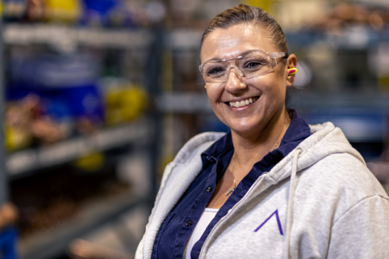 Person smiling with safety goggles