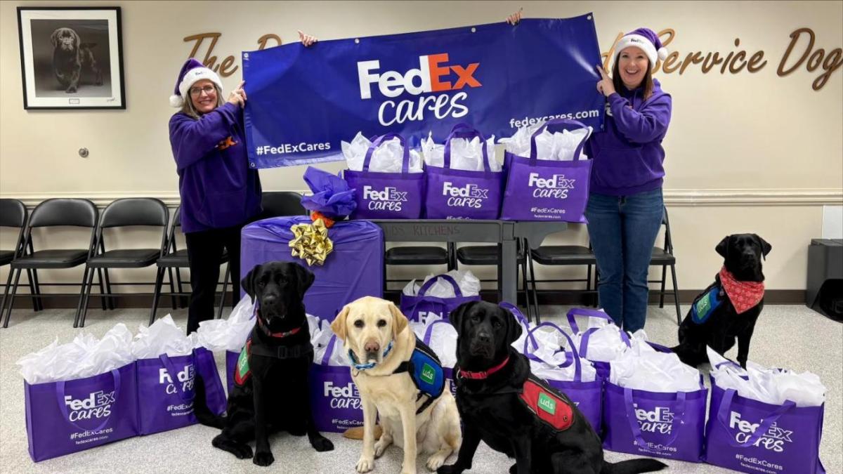 Santa Paws representatives and dogs