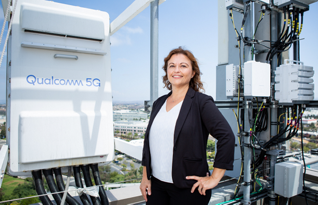 Dr. Yeliz Tokgoz poses with 5G technology