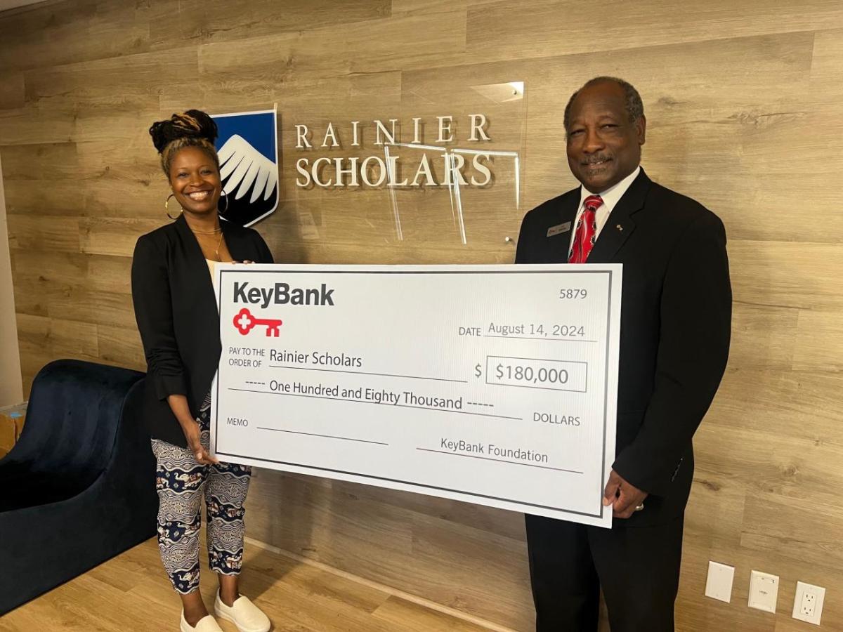 Representatives from Rainier Scholars receive a grant check from KeyBank for $180,000.