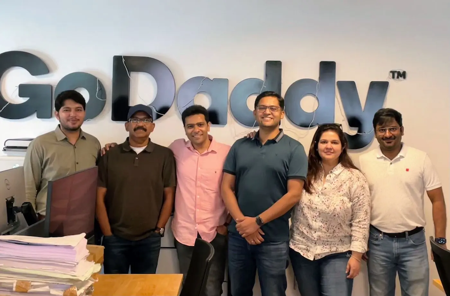 Ravi shown with coworkers at GoDaddy.