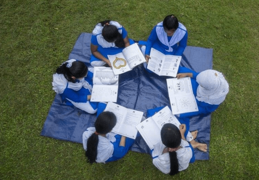 circle of girls reading