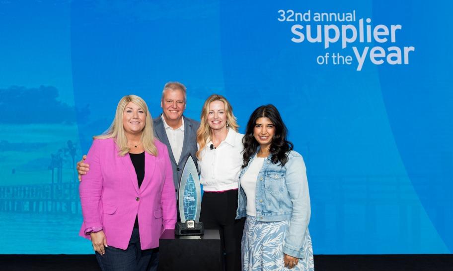 GM Supplier of the year award. HARMAN Team shown accepting the award.