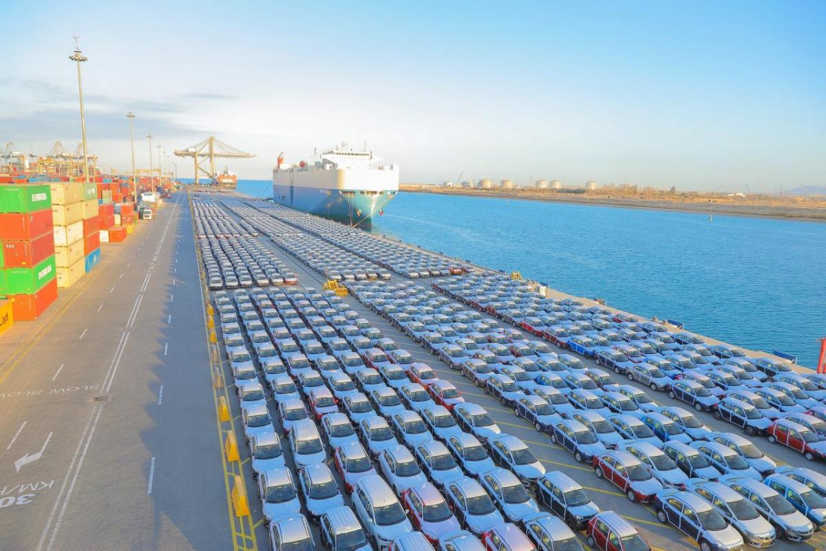 Rows of cars at port, ready to be shipped