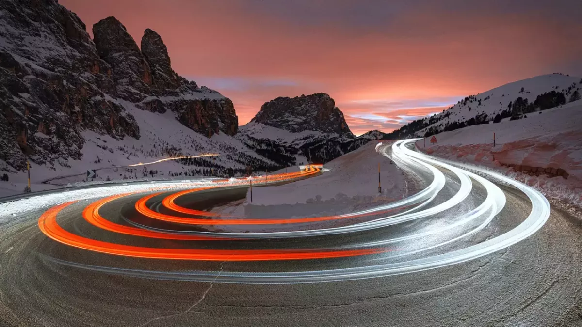 Road on an incline surrounded by mountains 