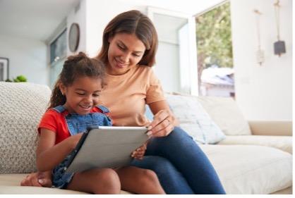 adult and child reading together