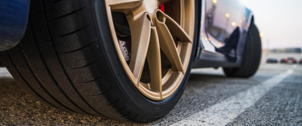 View from under a vehicle of its tire