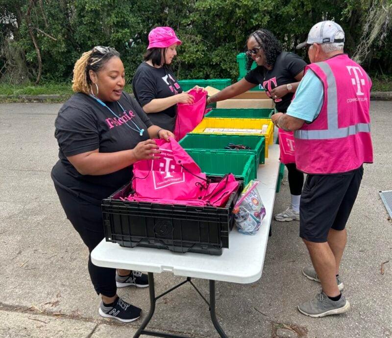 A team of volunteers helping to pack bags 