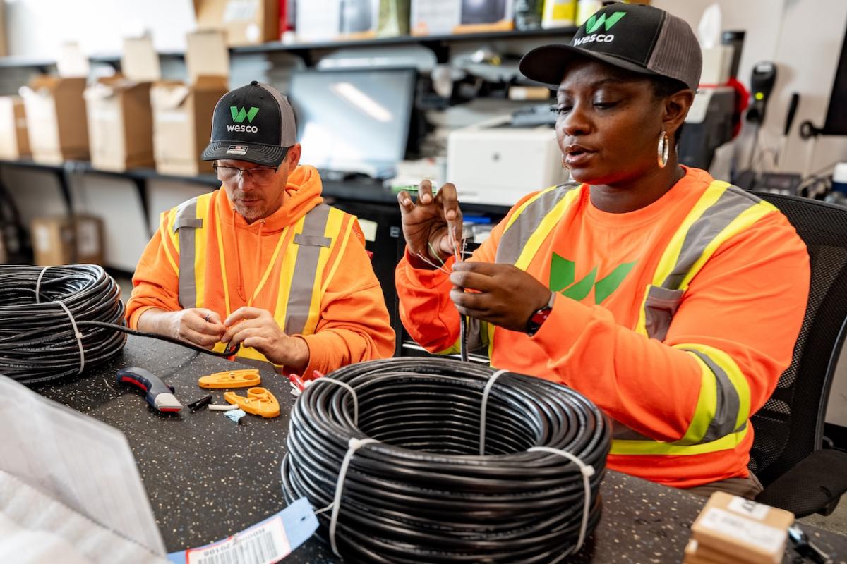 Wesco employees shown working on a production line.