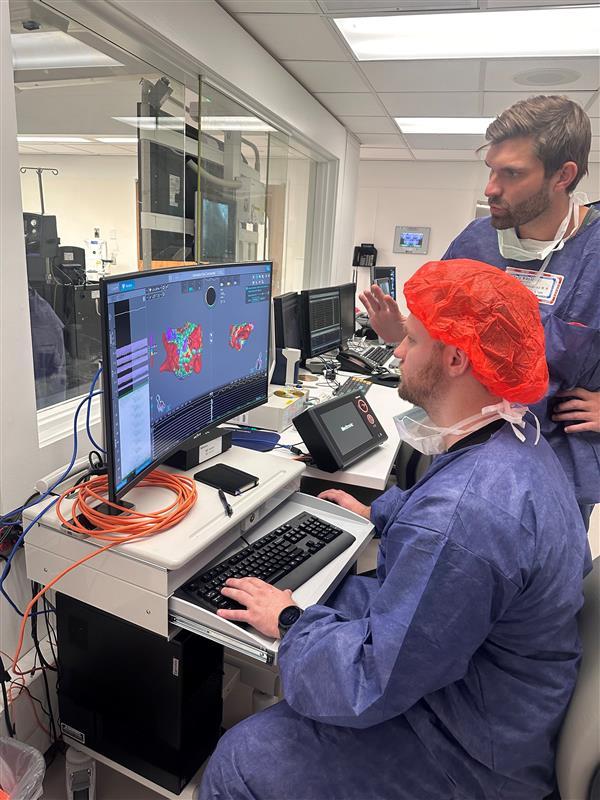 Will Brown shadows a case with Kyle Mikolowski, Principal EP Mapping Specialist