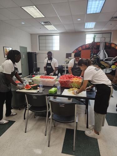 Team preparing food for the ceremony.