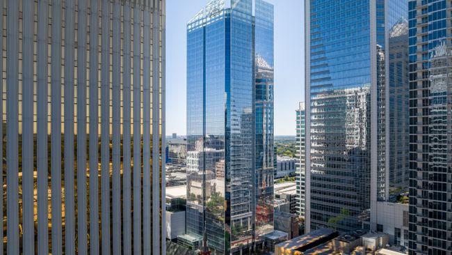 Tall skyscraper buildings in a cityscape.