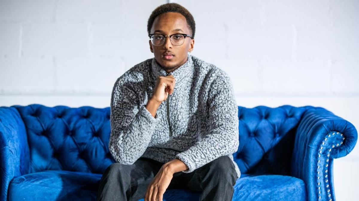 Anwar Dougsiyeh, co-founder of Lotus Rosery Music Festival, inside of his office in midtown Atlanta. Credit: Cliff Robinson