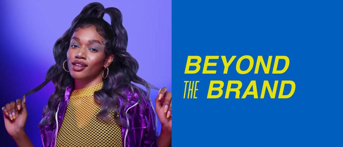 "Beyond the Brand" next to a person posing with long wavy hair.