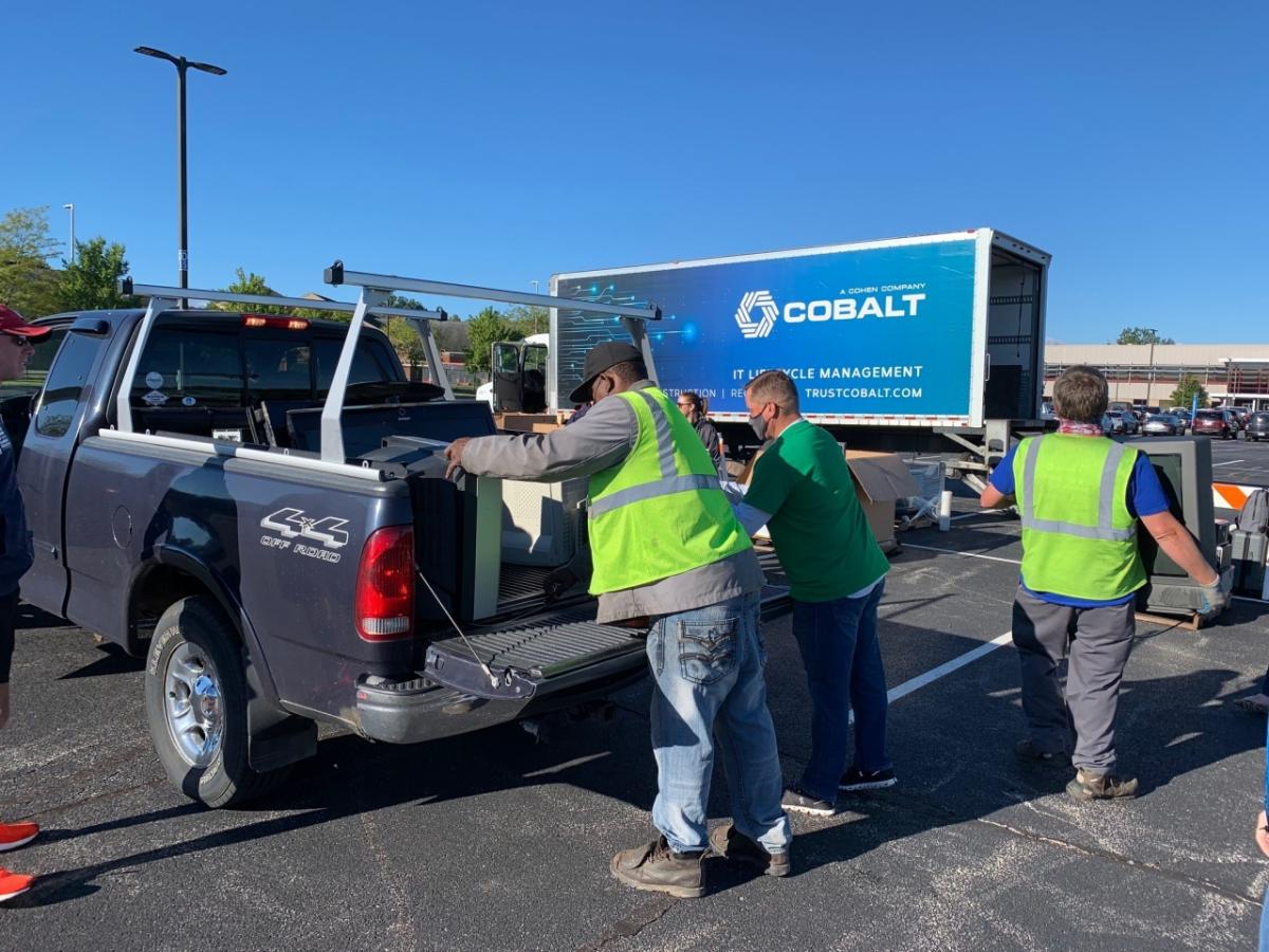 people loading a truck