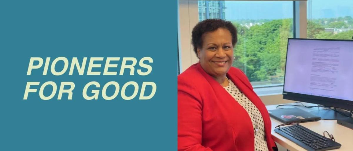 Pioneers for good | Carita Hughes in a red jacket, smiling